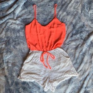 Cute neon peachy pink and off white romper